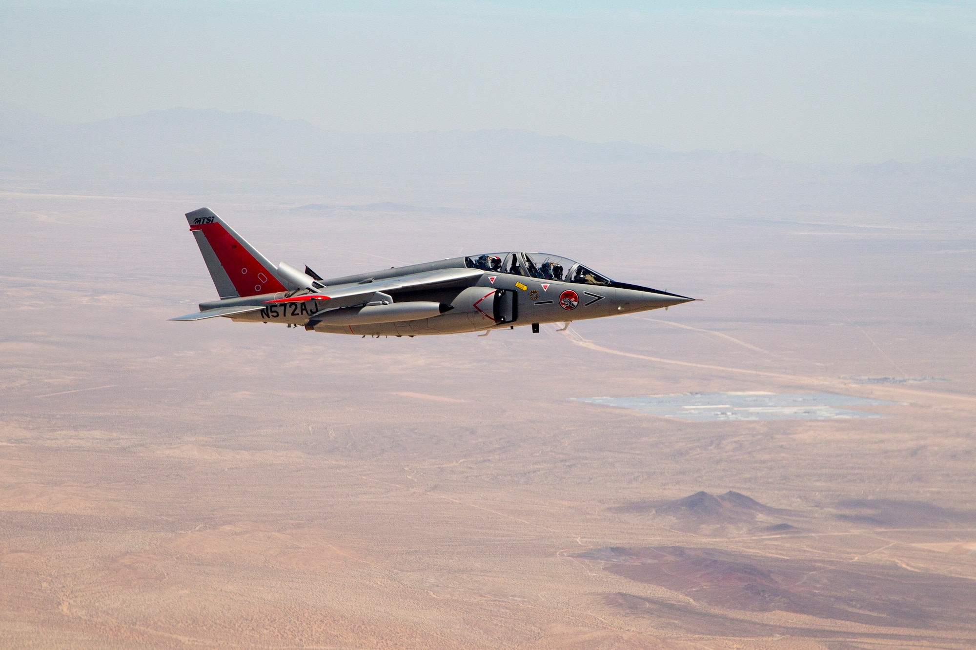 A Gauntlet Aerospace Alpha Jet flies above the Mojave Desert earlier this year. Two Alpha Jets have been contracted to serve as chase aircraft for test missions at Edwards. The 412th Operations Group is conducting an experiment to determine if the planes can successfully provide needed test support. (U.S. Air Force photo by Ethan Wagner)