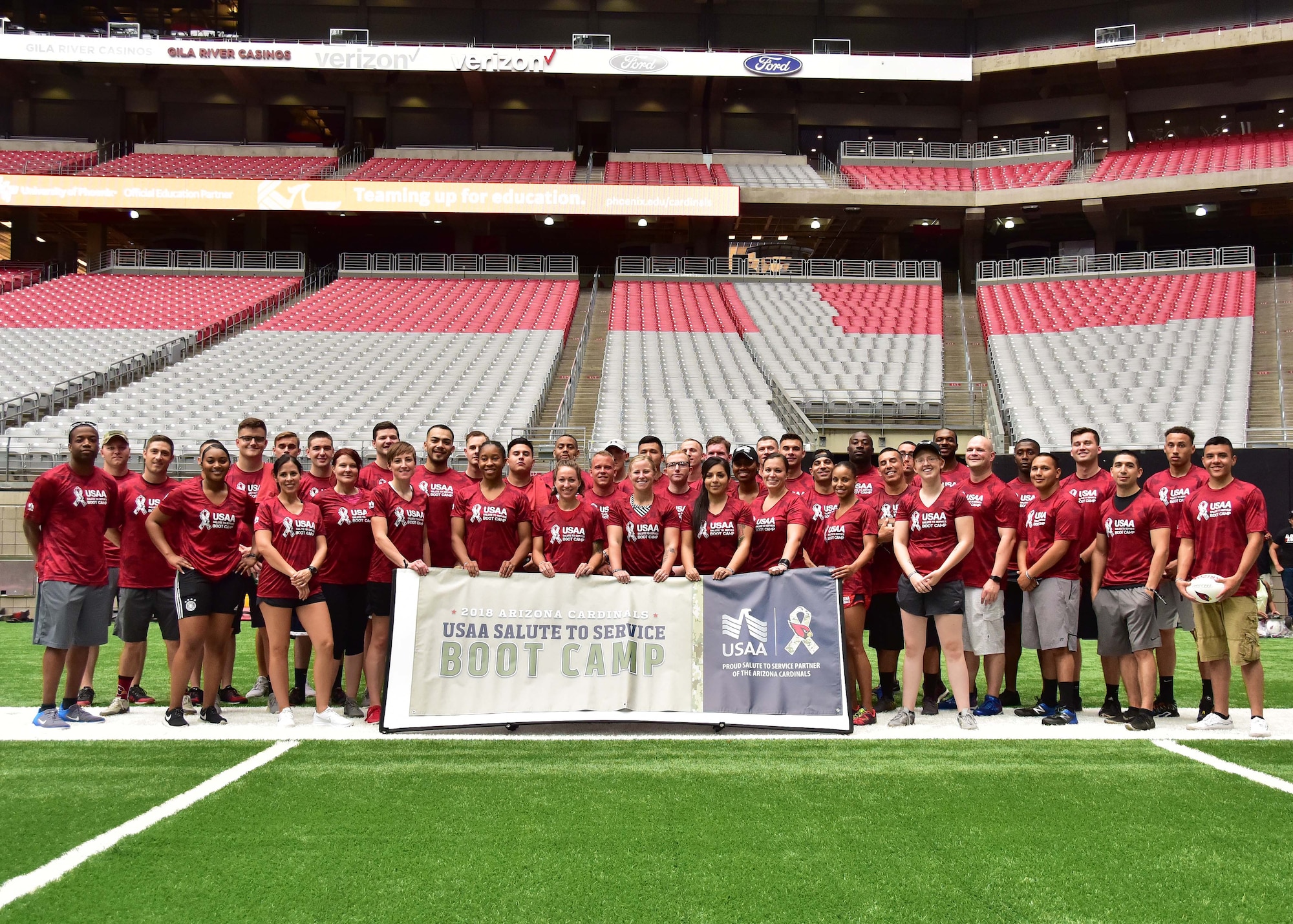 Around 65 service members from Luke Air Force Base, Arizona, participate in the 2018 USAA Salute to Service Arizona Cardinals National Football League Boot-Camp experience Aug 2 at the University of Phoenix Stadium, Glendale, Ariz.
