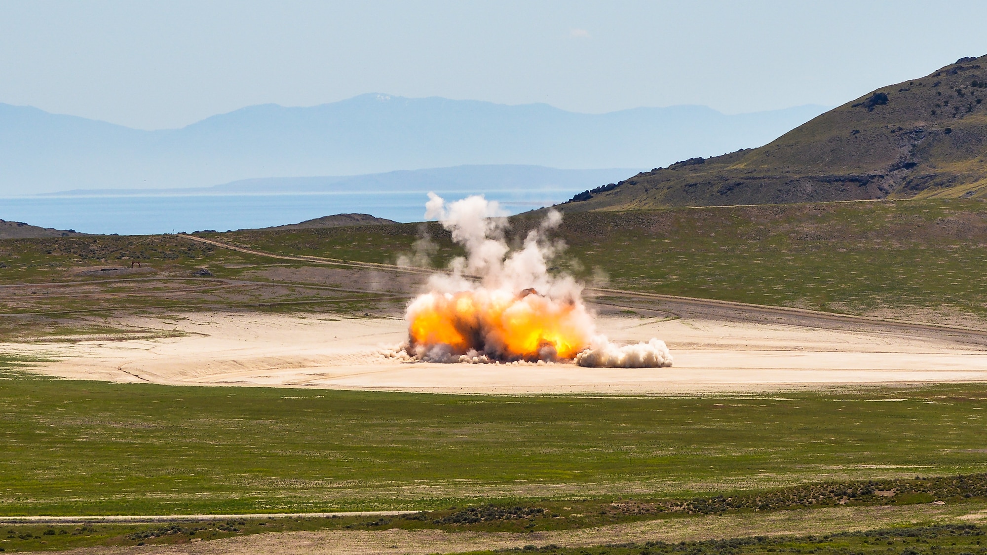 The Air Force detonates a solid-rocket motor June 2, 2015, at the Utah Test and Training Range in Utah. A series of large detonation operations will begin in early August and last through the end of September 2018 at the range. The destruction of the motors is occurring to eliminate aged propellant, and as part of international treaties to reduce the number of ballistic missiles. (U.S. Air Force photo by R. Nial Bradshaw)