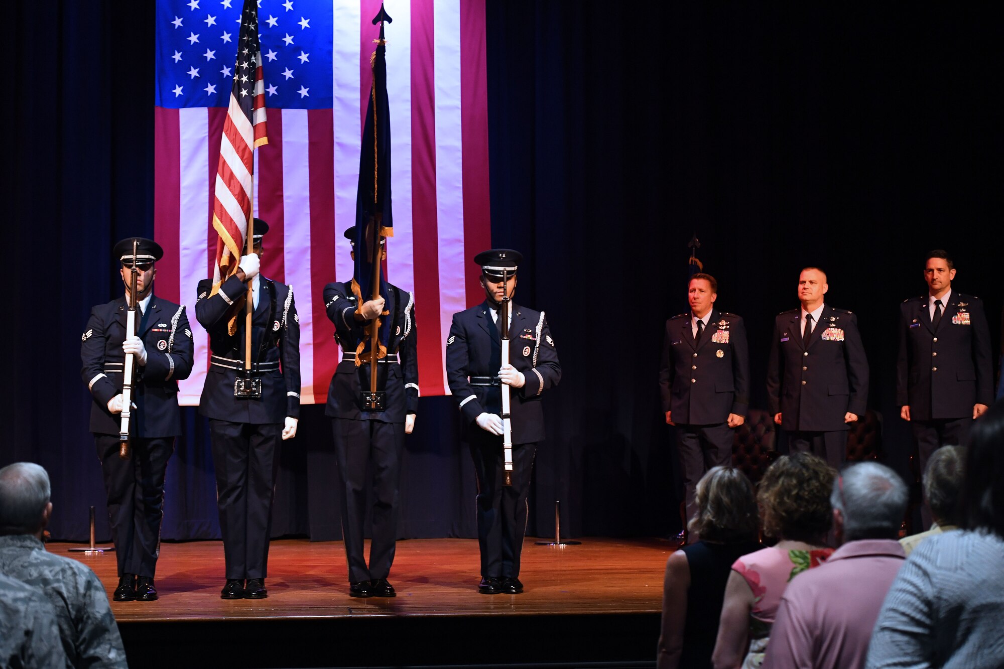 Airmen present the colors.