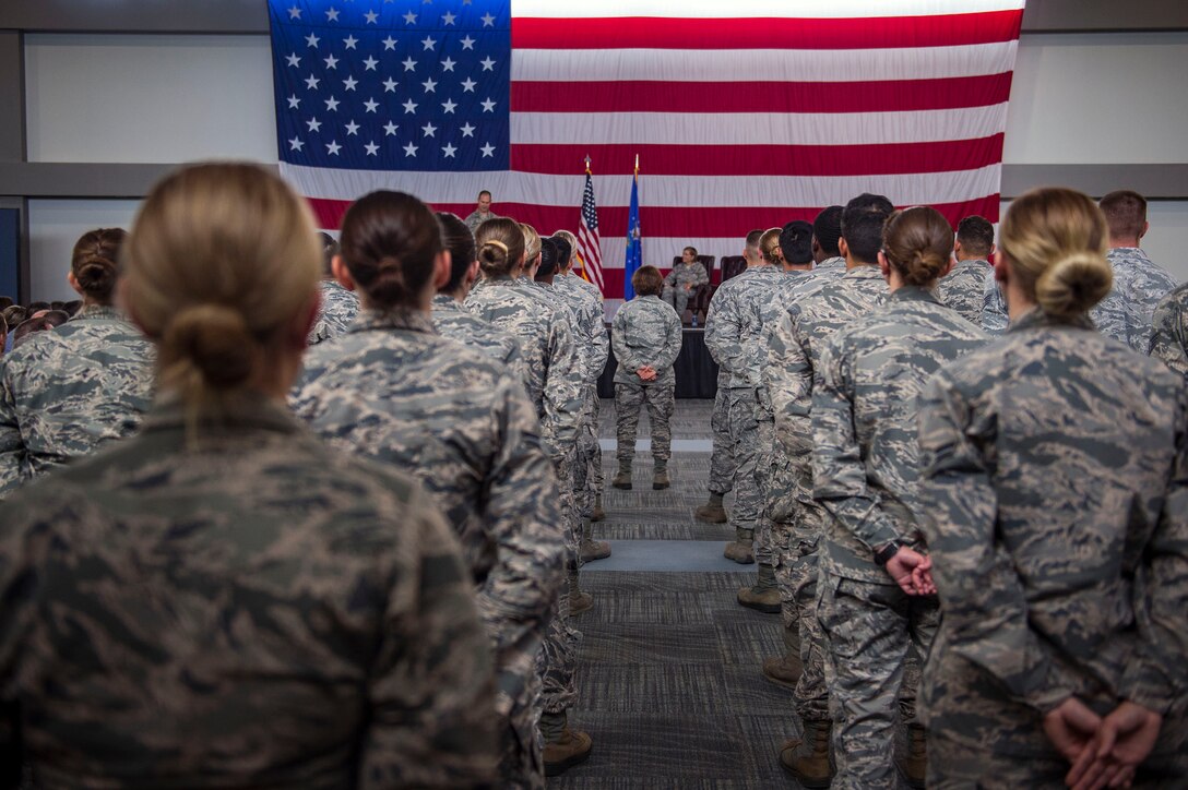 The Tiger Medics of the 23d Medical Group stand in formation during a change of command ceremony, Aug. 3, 2018, at Moody Air Force Base, Ga. The 23d MDG recognized the formal transfer of authority and responsibility for their unit as Col. Jay Vietas relinquished command to Col. Tiffany Morgan. The 23d MDG is comprised of 280 staff members that provide outpatient medical, dental, occupational, environmental and preventive healthcare services in support of two combat ready wings. (U.S. Air Force photo by Senior Airman Greg Nash)