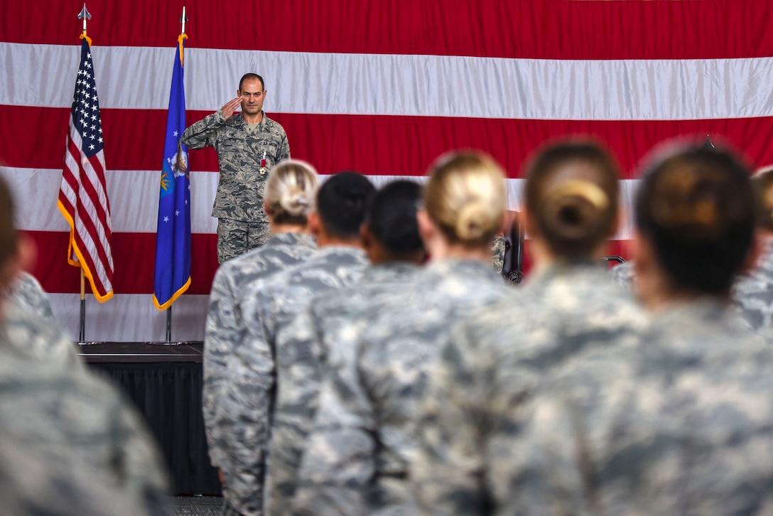 Col. Jay Vietas, 23d Medical Group commander, renders his final salute as the leader of the Tiger Medics during a change of command ceremony, Aug. 3, 2018, at Moody Air Force Base, Ga. Vietas and his family will depart to Falls Church, Va., to become an Associate Corps Chief for Bioenvironmental Engineering.  (U.S. Air Force photo by Senior Airman Greg Nash)