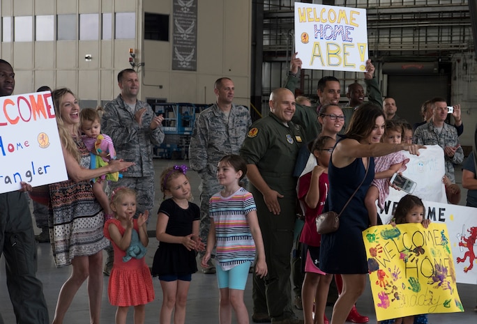 Family and friends welcome home Airmen from the 16th Airlift Squadron August 2, 2018, at Joint Base Charleston S.C. The 16th AS Airmen managed to complete a total of 1,045 sorties over a span of 2,212 hours, moving 35.6 million pounds of cargo to include 4,980 pallets and 10,914 passengers during their three-month tour in the Air Force Central Command area of responsibility.