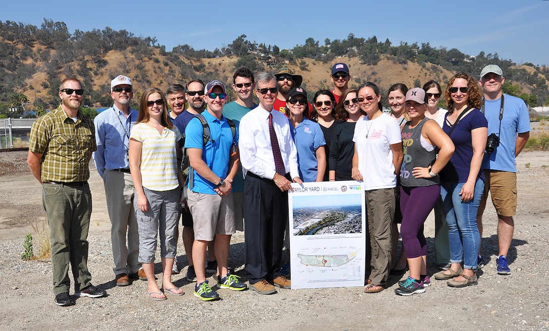 Students and instructors with the U.S. Army Corps of Engineers Planning Associates program, along with representatives from the City of Los Angeles and other agencies pose for a picture July 25 at a site near the LA River. The city recently purchased the 42 acres of land for ecosystem restoration.