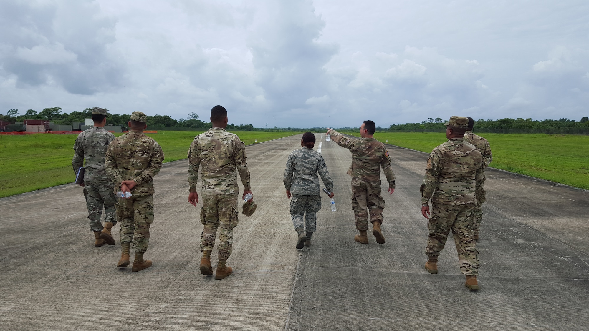 Air Advisors assigned to the 571st Mobility Support Advisory Squadron and students from the National Air and Naval Service of Panama, also known as SENAN, conduct a runway assessment at the forward operation location of Nicanor Air Base in Panama. Approximately 235 hours of assessments, seminars, and hands-on practicum took place at five bases within the Panama City location, graduating 63 SENAN personnel from multiple duty specialties. (U.S. Air Force Photo by Lt. Col. Christopher Shea)