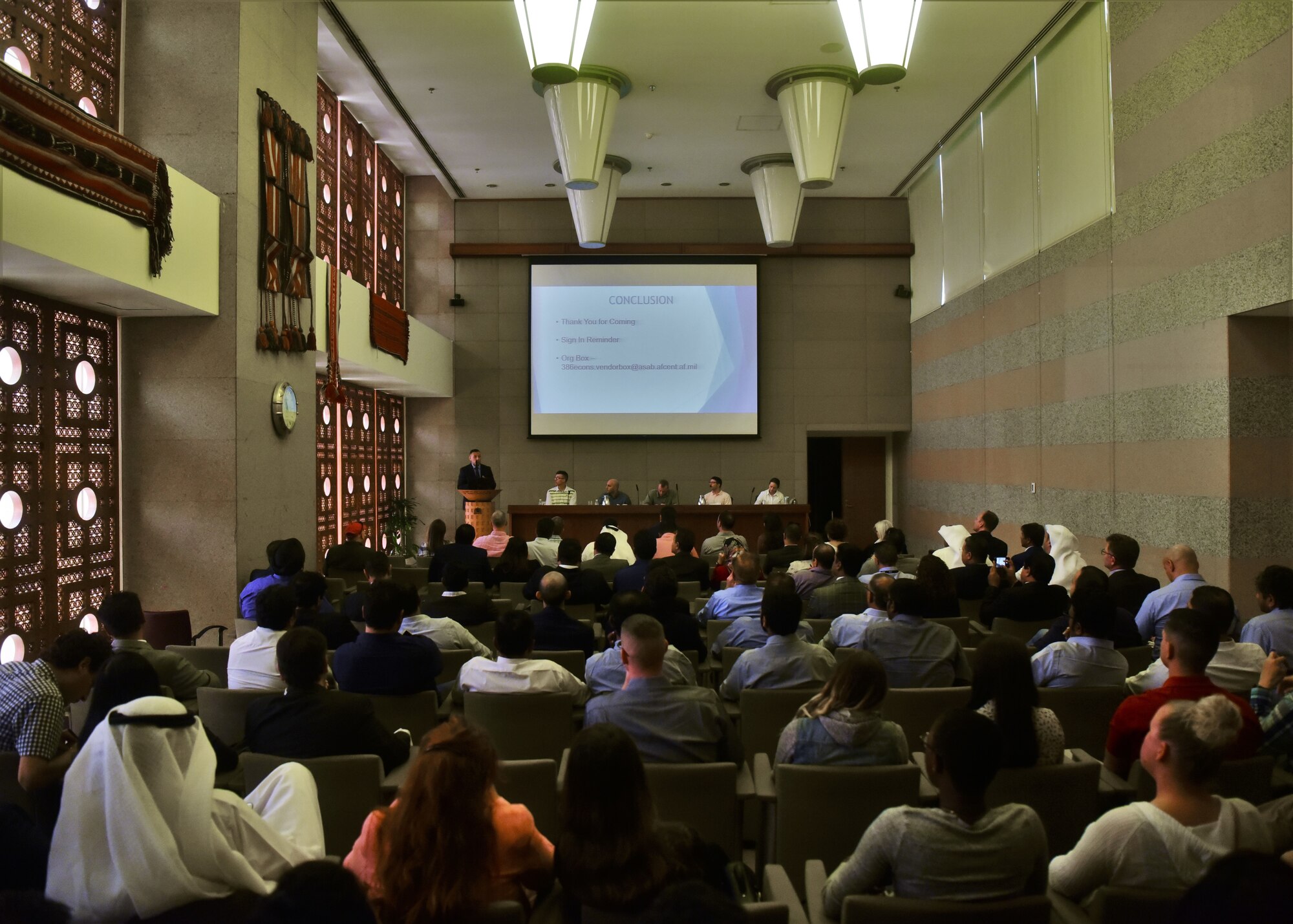 Members of the 386th Expeditionary Contracting Squadron field questions from the audience at ‘vendor day,’ held June 27, 2018, at the Kuwait Chamber of Commerce. Vendor Day served as an outreach symposium for prospective clients and local vendors doing business with the United States Air Force and coalition partners. (U.S. Air Force photo by Staff Sgt. Christopher Stoltz)
