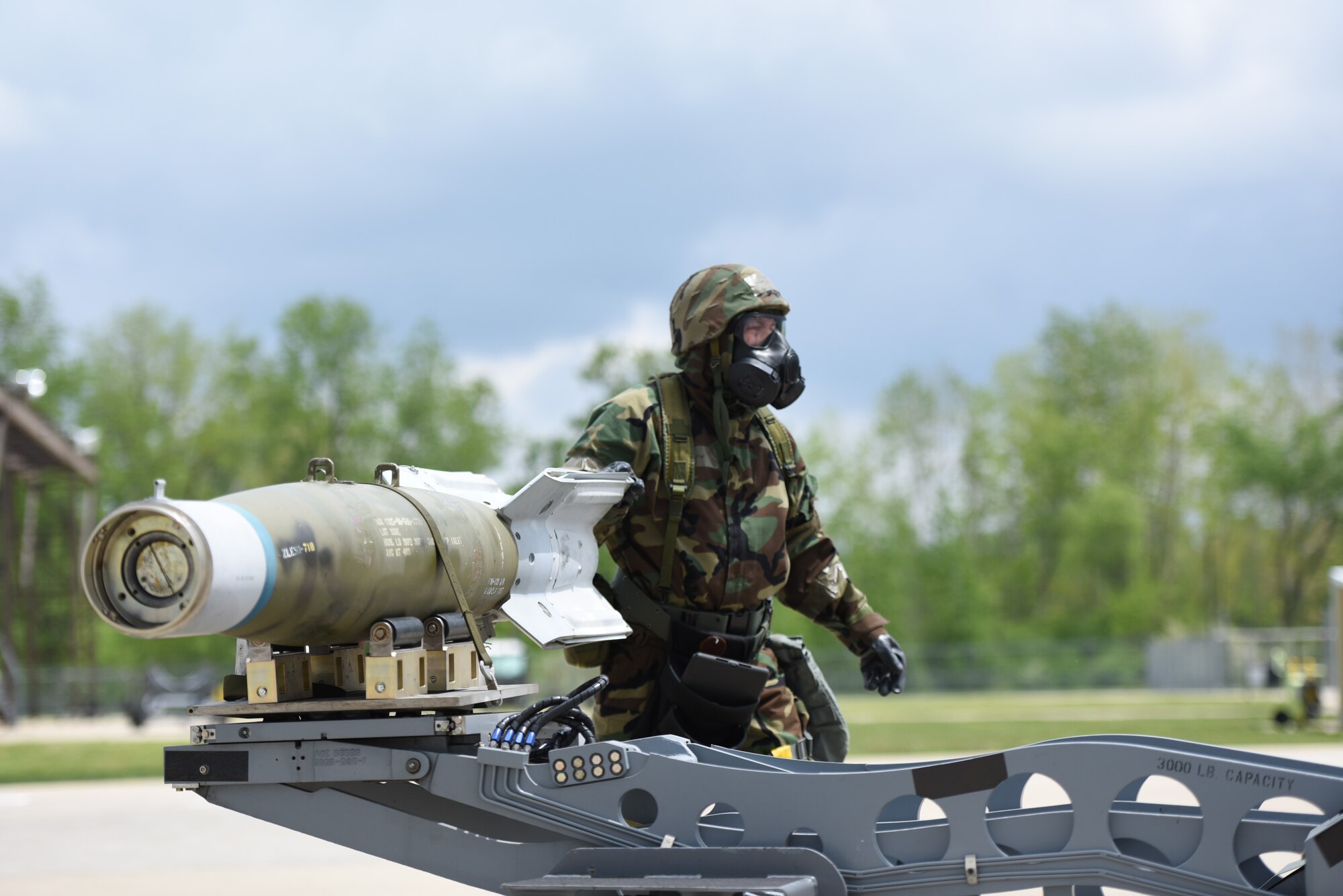 180FW maintenance group operates in MOPP gear