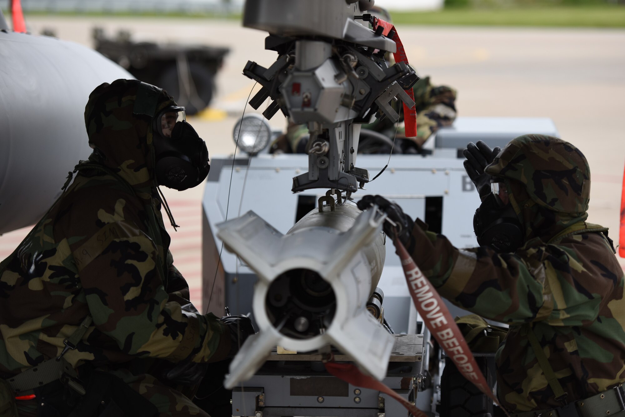 180FW maintenance group operates in MOPP gear