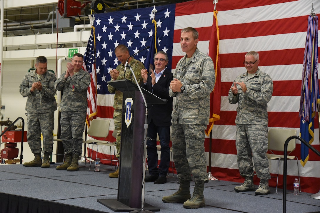 Col. Darrin Anderson, new 119th Wing commander, speaks to unit members during change of command ceremony at the North Dakota Air National Guard Base, Fargo, N.D., Aug. 4, 2018.