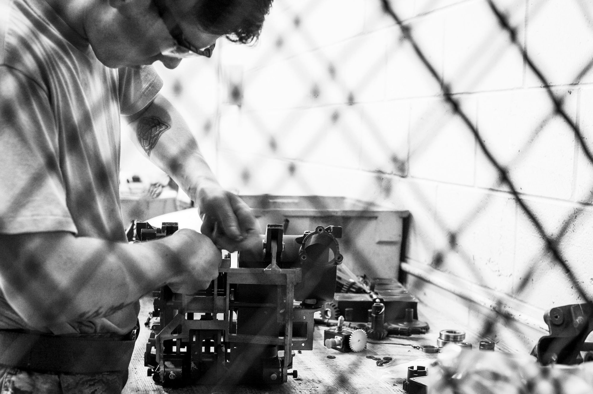 U.S. Air Force Senior Airman J.T. Owen, 20th Equipment Maintenance Squadron armament maintenance team member, assembles a M61A1 Vulcan 20 mm rotary cannon access unit at Shaw Air Force Base, S.C., Aug. 2, 2018.