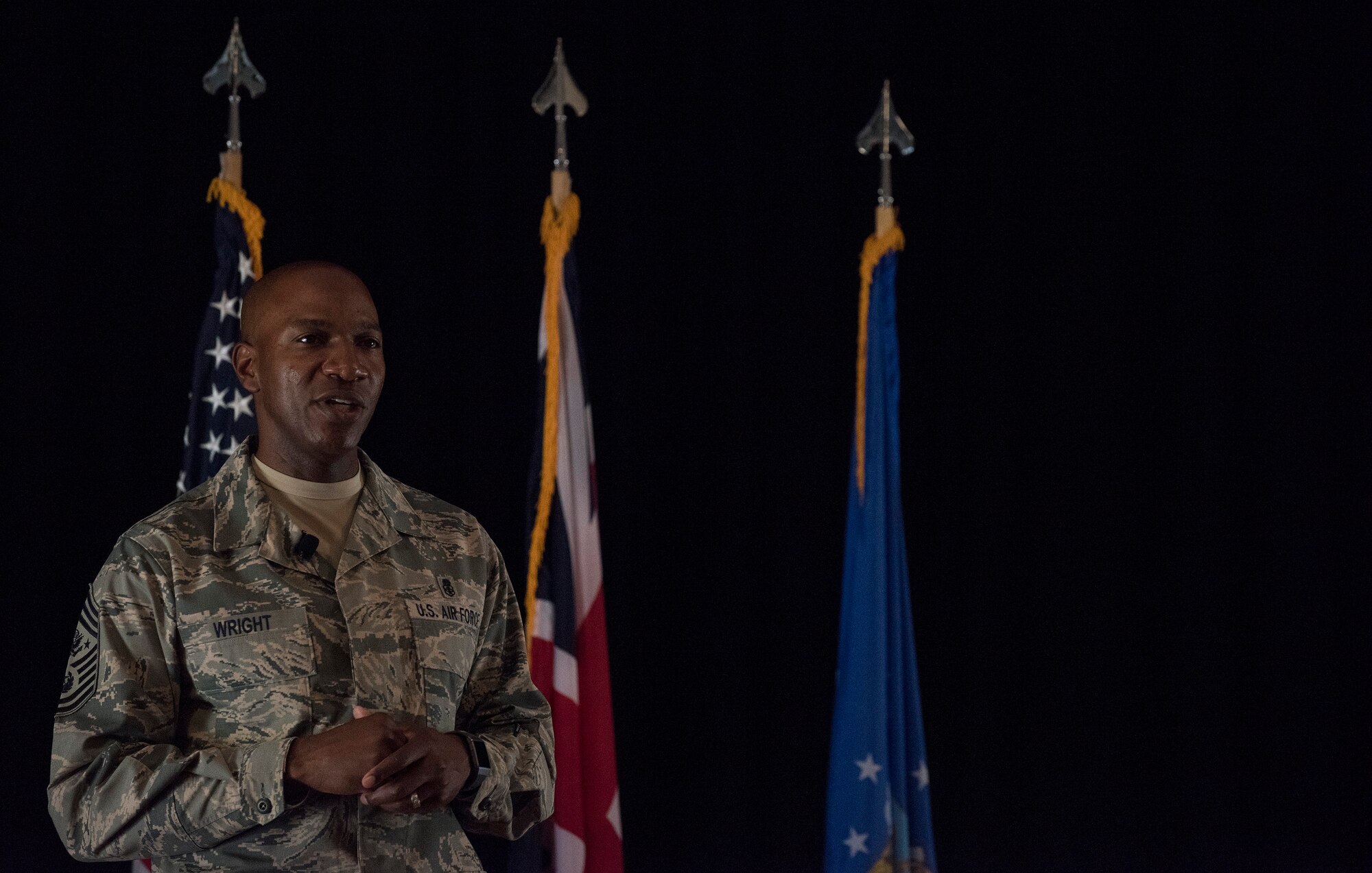 Chief Master Sgt. of the Air Force, Kaleth O. Wright, speaks with Airmen from the 501st Combat Support Wing (CSW) and partnering tenant units during an all call on Aug. 3, 2018 at RAF Alconbury, United Kingdom. The purpose of his visit was to meet U.S. Air Force Airmen, speak about some current Air Force topics and learn more about the 501st CSW mission. (U.S. Air Force photo by TSgt. Brian Kimball)