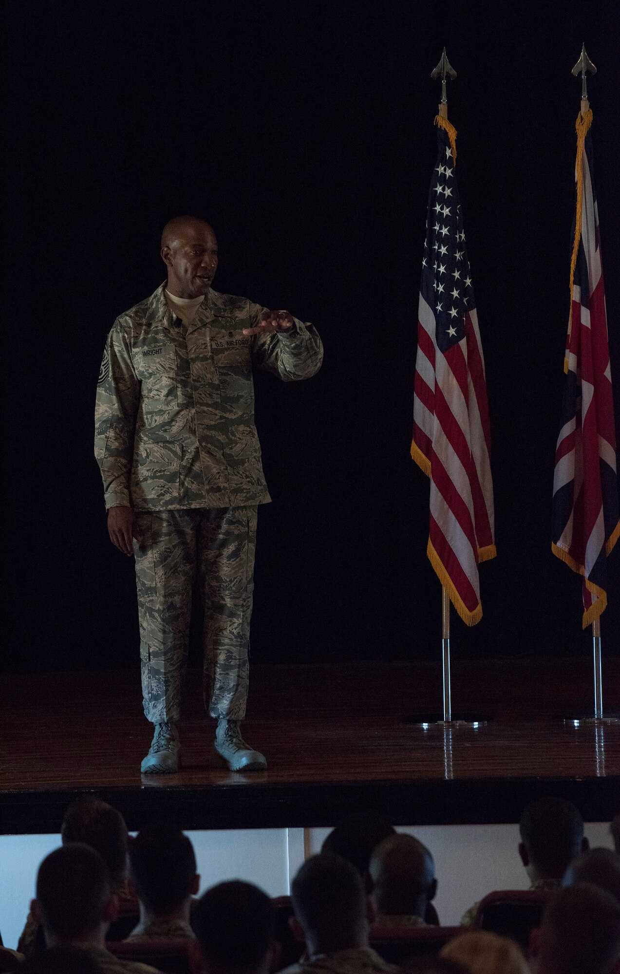 Chief Master Sgt. of the Air Force, Kaleth O. Wright, speaks with Airmen from the 501st Combat Support Wing (CSW) and partnering tenant units during an all call on Aug. 3, 2018 at RAF Alconbury, United Kingdom. The purpose of his visit was to meet with U.S. Air Force Airmen, speak about some current Air Force topics and learn more about the 501st CSW mission. (U.S. Air Force photo by TSgt. Brian Kimball)