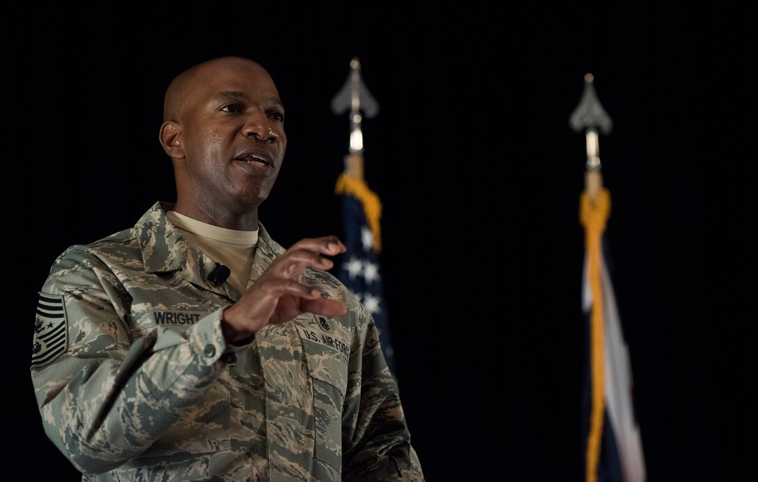 Chief Master Sgt. of the Air Force, Kaleth O. Wright, speaks with Airmen from the 501st Combat Support Wing (CSW) and partnering tenant units during an all call on Aug. 3, 2018 at RAF Alconbury, United Kingdom. The purpose of his visit was to meet with U.S. Air Force Airmen, speak about some current Air Force topics and learn more about the 501st CSW mission. (U.S. Air Force photo by TSgt. Brian Kimball)