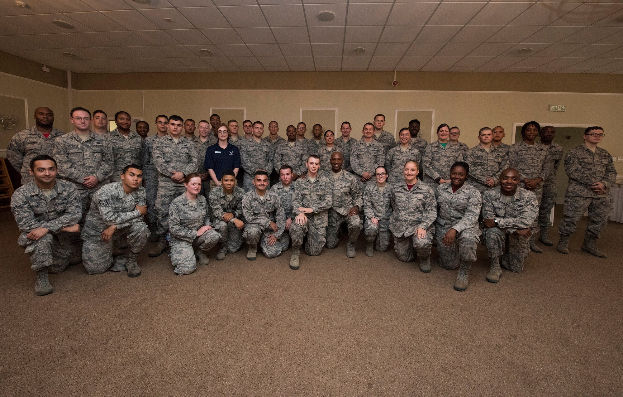 Chief Master Sgt. of the Air Force (center), Kaleth O. Wright, takes the time to have his photo taken with Airmen from the 501st Combat Support Wing (CSW) and partnering tenant units during a base visit on Aug. 3, 2018 at RAF Alconbury, United Kingdom. The purpose of his visit was to meet with U.S. Air Force Airmen, speak about some current Air Force topics and learn more about the 501st CSW mission. (U.S. Air Force photo by TSgt. Brian Kimball)
