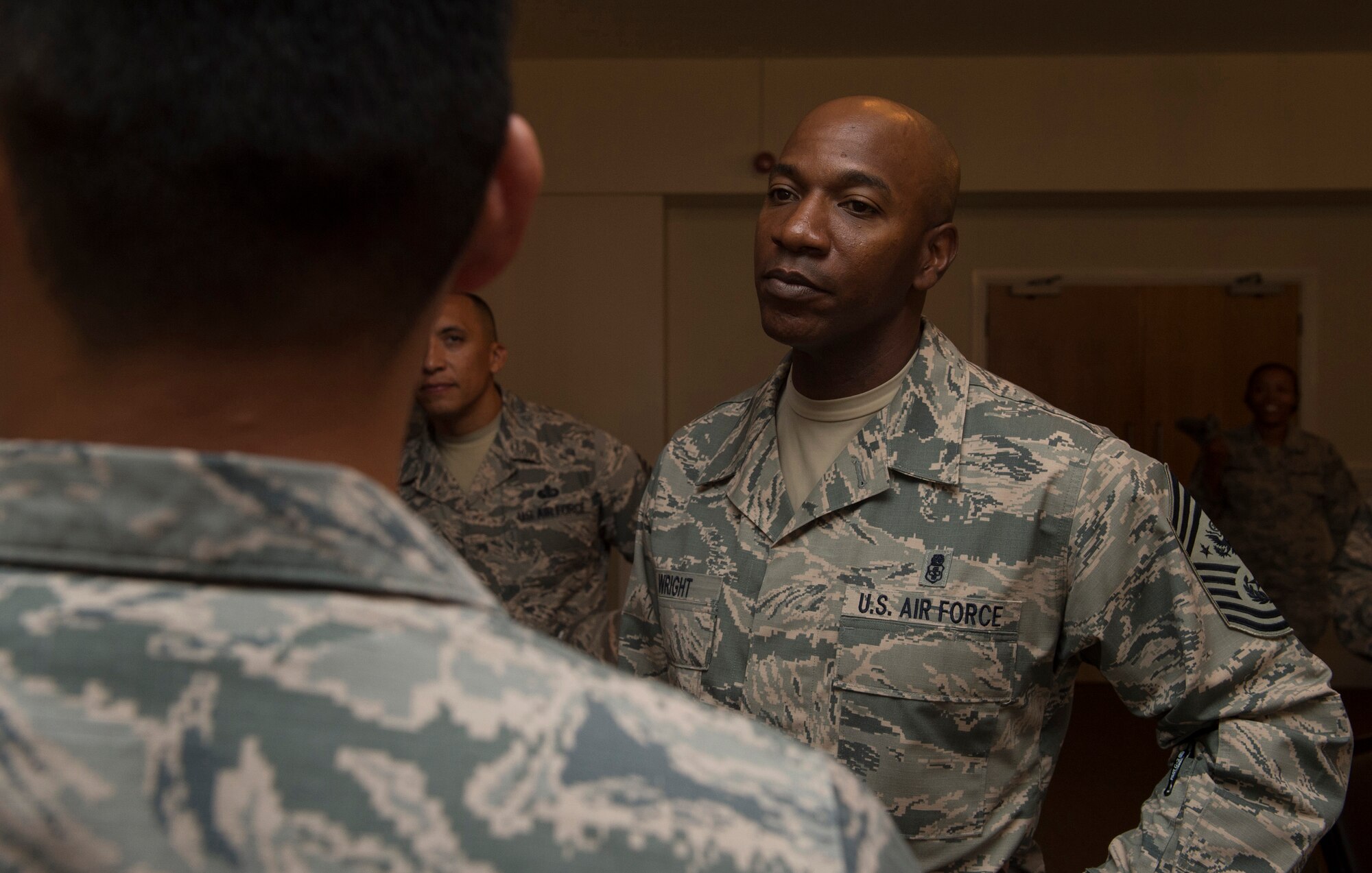 Chief Master Sgt. of the Air Force, Kaleth O. Wright, speaks with Airmen from the 501st Combat Support Wing (CSW) during a base visit on Aug. 3, 2018 at RAF Alconbury, United Kingdom. The purpose of his visit was to meet U.S. Air Force Airmen, speak about some current Air Force topics and learn more about the 501st CSW mission. (U.S. Air Force photo by TSgt. Brian Kimball)