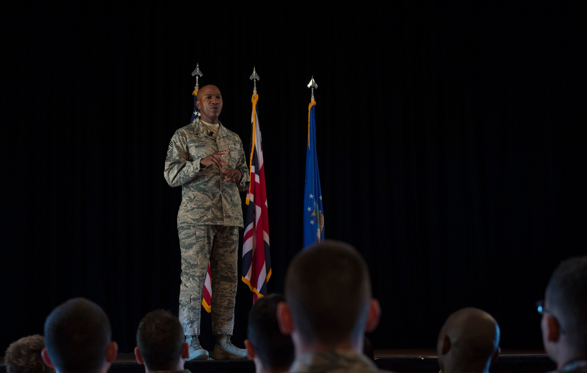 Chief Master Sgt. of the Air Force, Kaleth O. Wright, speaks with Airmen from the 501st Combat Support Wing (CSW) and partnering tenant units during an all call on Aug. 3, 2018 at RAF Alconbury, United Kingdom. The purpose of his visit was to meet with U.S. Air Force Airmen, speak about some current Air Force topics and learn more about the 501st CSW mission. (U.S. Air Force photo by TSgt. Brian Kimball)