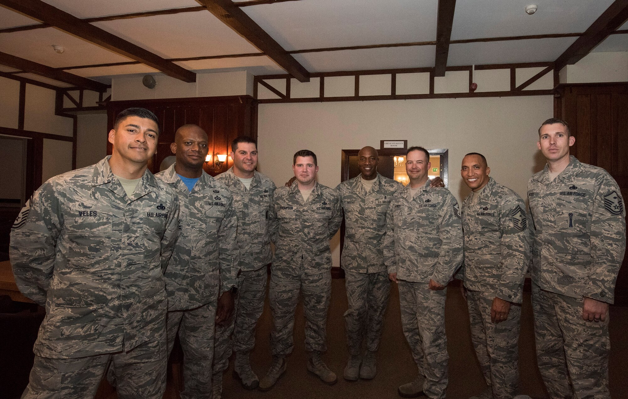 Chief Master Sgt. of the Air Force (center), Kaleth O. Wright, takes the time to have his photo taken with Airmen from the 501st Combat Support Wing (CSW) and partnering tenant units during a base visit on Aug. 3, 2018 at RAF Alconbury, United Kingdom. The purpose of his visit was to meet with U.S. Air Force Airmen, speak about some current Air Force topics and learn more about the 501st CSW mission. (U.S. Air Force photo by TSgt. Brian Kimball)
