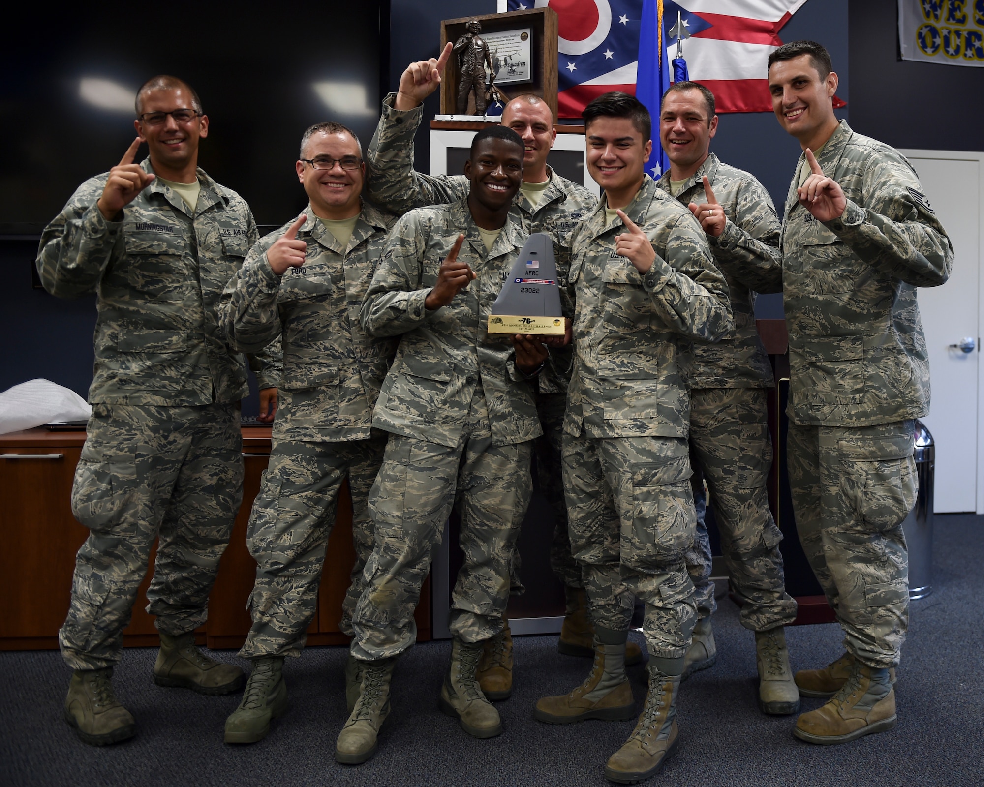 The 76th Aerial Port Squadron holds the 76er competition annually as a fun way to train. The competition consists of six parts: a hundred question test, a pallet build up, a 10K forklift obstacle course, a 25K Halverson obstacle course, a team physical training course, and an Engine Running Onload/Offload without the engine running.