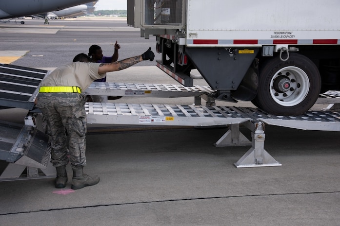 Members of the 437th Aerial Port Squadron conduct a test load of a Large Mobile Air Traffic Control Tower onto a C-17 Globemaster III July 26, 2018, at the Joint Base Charleston Air Base.