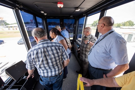 Space and Naval Warfare Systems Center Atlantic engineers and Federal Aviation Administration officials tour the inside of a recently developed Large Mobile Air Traffic Control Tower July 26, 2018, at the Joint Base Charleston Weapons Station.