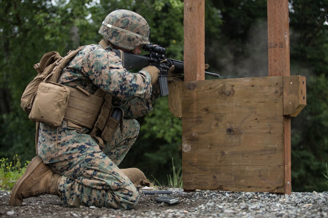 Lance Cpl. Albert Rivera, with Charlie Company, 1st Battalion, 24th Marine Regiment, 25th Marine Regiment, a competitor in the 4th Marine Division Annual Rifle Squad Competition, conducts an Unknown Distance course of fire at Joint Base Elmendorf-Richardson, Anchorage, Alaska, August 2, 2018. Super Squad Competitions were designed to evaluate a 14-man infantry squad throughout an extensive field and live-fire evolution. (U.S. Marine Corps photo by Lance Cpl. Samantha Schwoch/released)