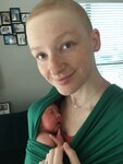 Agnieszka Chauviere holds her daughter Emilia Jennifer. Chauviere decided to join the CenteringPregnancy group because she was new to the military family and to San Antonio.