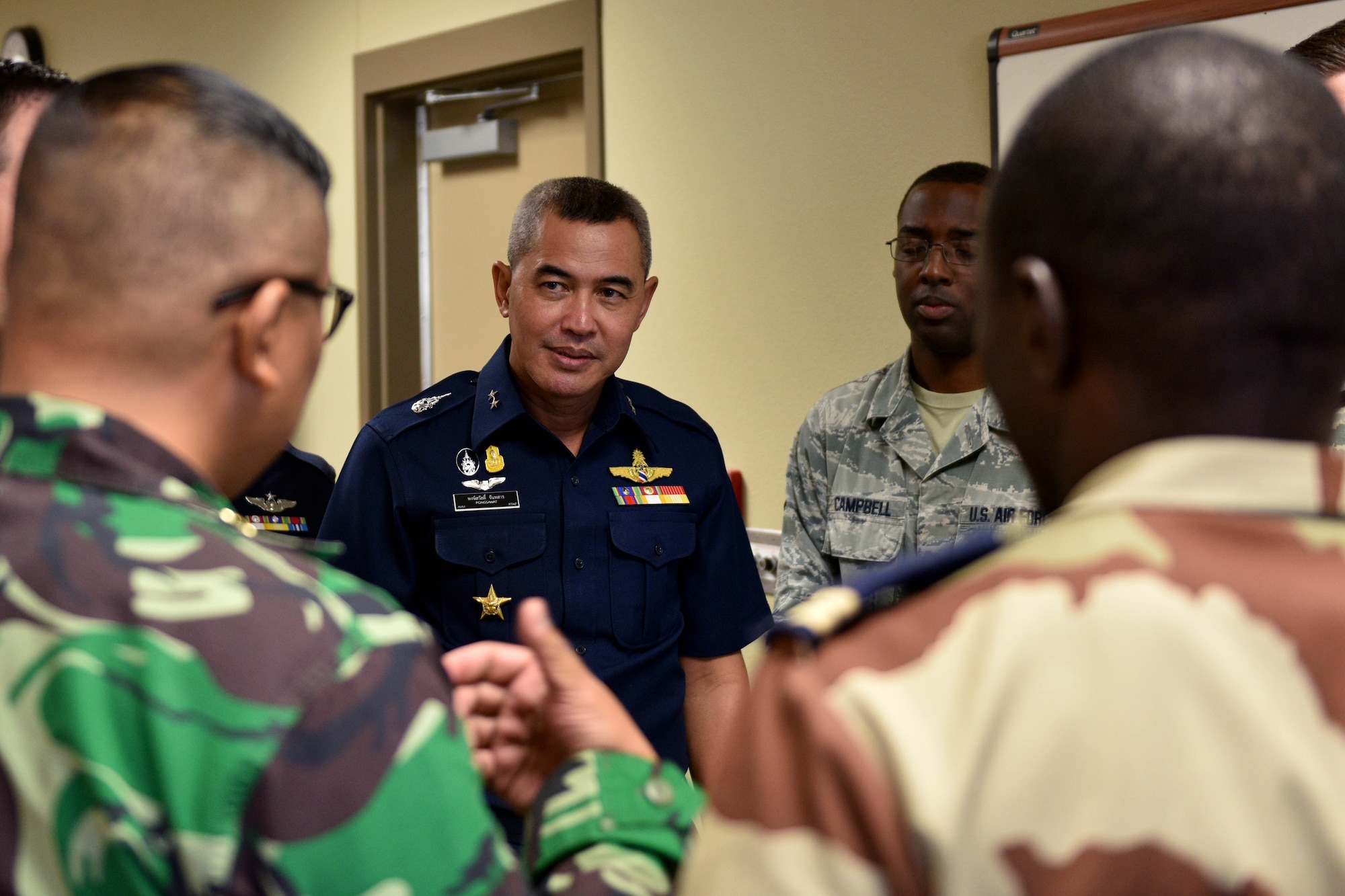 International military students provide Royal Thai air force Air Vice Marshall Pongsawat Jantasarn, their perspective on training alongside 315th Training Squadron students in the Consolidated Learning Center on Goodfellow Air Force Base, Texas, Aug. 2, 2018. The team observed a daylong-integrated analytics exercise by the 315th TRS’s intelligence officer students and 11 international students from nine different countries. (U.S. Air Force photo by Senior Airman Randall Moose/Released)