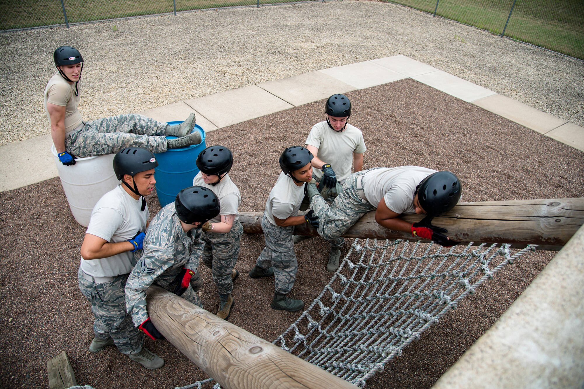 Wisconsin Air National Guard junior enlisted Airmen navigate through the leadership development course July 26, 2018, at Volk Field Air National Guard Base, Wisconsin. The Airmen were participants of the 2018 Junior Enlisted Orientation Program which allows junior enlisted Airmen to better understand the mission of all the units in the Wisconsin Air National Guard. 
(U.S. Air National Guard photo by Airman Cameron Lewis)