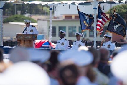 PEARL HARBOR (August 3, 2018) - Cmdr. Dave Edgerton, outgoing commanding officer of Los Angles-class fast-attack submarine USS Columbia (SSN 771) delivers remarks during the change of command ceremony on the historic submarine piers at Joint Base Pearl Harbor-Hickam, August 3. Cmdr. Tyler Forrest relieved Cmdr. Dave Edgerton as Columbia’s commanding officer. (U.S. Navy photo by Mass Communication Specialist 1st Class Daniel Hinton)