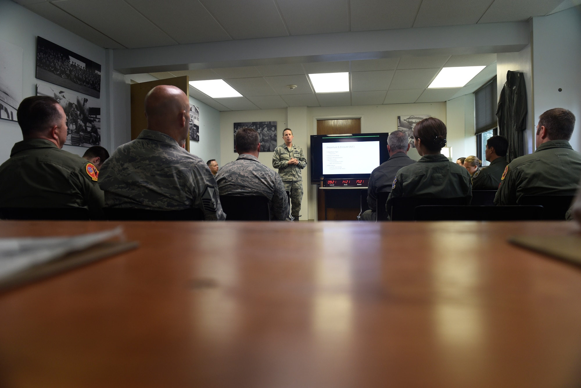 Nebraska Air National Guard Lt. Col. Mike Holdcroft, 170th Operational Support Squadron commander, leads a preflight mission-briefing Aug. 4, 2018 at Offutt Air Force Base, Nebraska. Holdcroft was the aircraft commander of the RC-135V/W Rivet Joint weekend training sortie with a flight and mission crew comprised almost exclusively of reserve component Airmen. The objective of the preflight briefing is to communicate a common operating picture of meteorological and aeronautical information to the entire crew necessary for the conduct of a safe and efficient flight. (U.S. Air Force photo by 2nd Lt. Drew Nystrom)