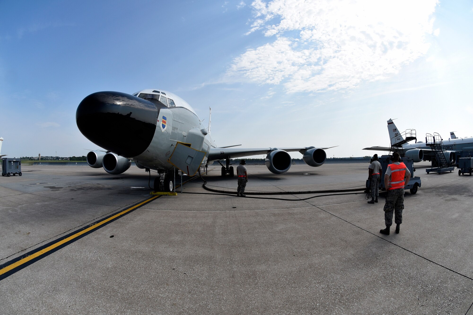 55th Aircraft Maintenance Squadron Airmen use a ground air cart to start the RC-135V/W Rivet Joint's four CFM International F108-CF-201 high-bypass turbofan engines Aug. 5, 2018 at Offutt Air Force Base, Nebraska.The aircraft is an extensively modified C-135. The Rivet Joint's modifications are primarily related to its on-board sensor suite, which allows the mission crew to detect, identify and geolocate signals throughout the electromagnetic spectrum. The mission crew can then forward gathered information in a variety of formats to a wide range of consumers via Rivet Joint's extensive communications suite. (U.S. Air Force photo by 2nd Lt. Drew Nystrom)