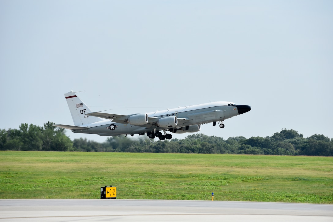 An Offutt-based RC-135V/W Rivet Joint takes flight Aug. 5, 2018 at Offutt Air Force Base, Nebraska. The aircraft was flown during a unique training sortie with a flight and mission-crew comprised almost exclusively of reserve component Airmen. The aircraft is an extensively modified C-135. The Rivet Joint's modifications are primarily related to its on-board sensor suite, which allows the mission-crew to detect, identify and geolocate signals throughout the electromagnetic spectrum. The mission-crew can then forward gathered information in a variety of formats to a wide range of consumers via Rivet Joint's extensive communications suite. (U.S. Air Force photo by 2nd Lt. Drew Nystrom)