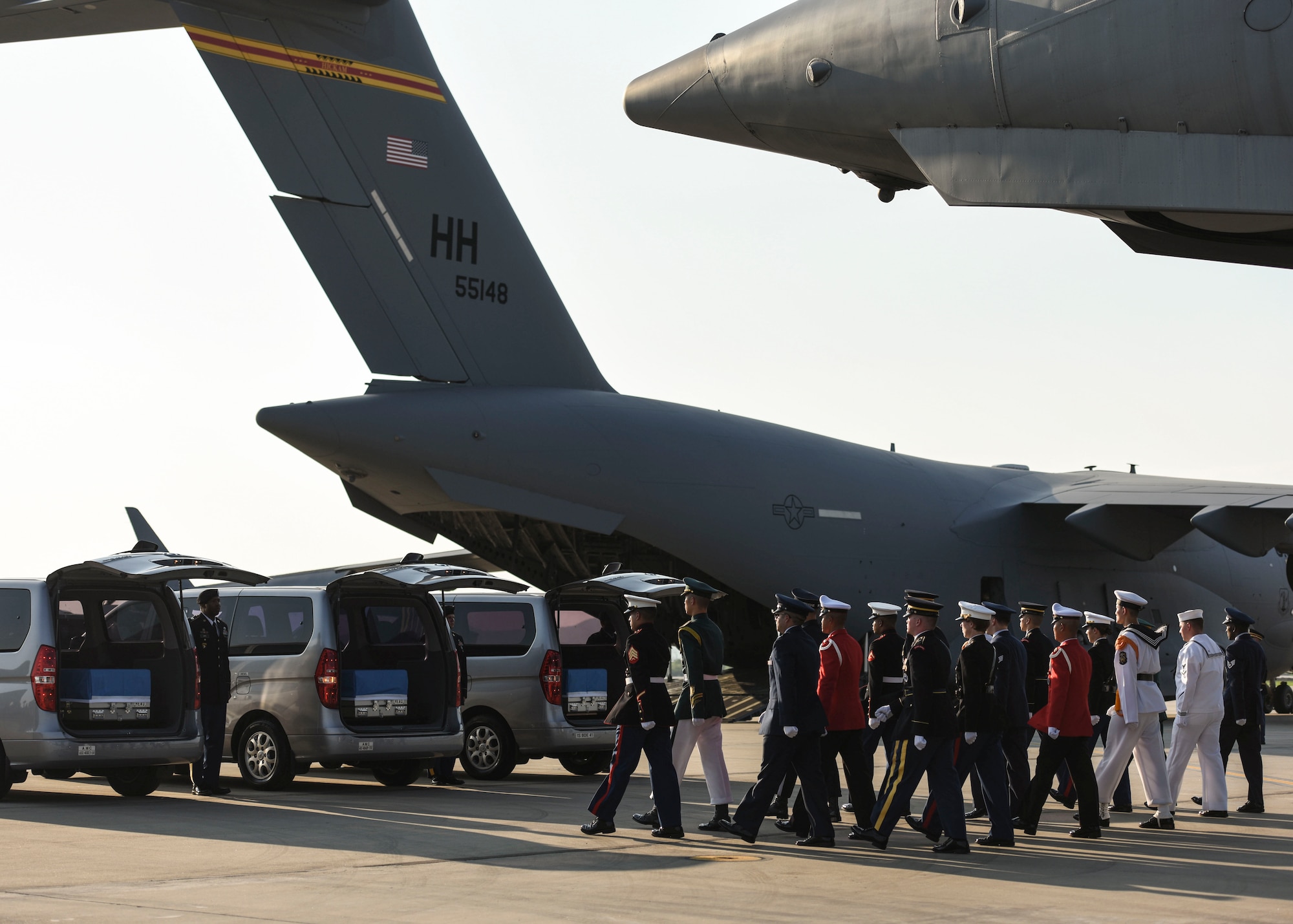 Members of the United Nations Command Honor Guard perform during a repatriation ceremony at Osan Air Base, Republic of Korea, Aug. 1, 2018.