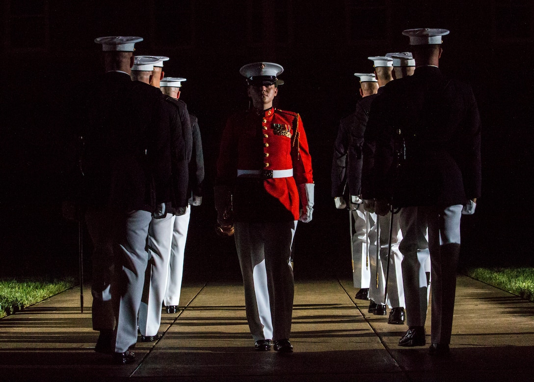 Staff Sgt. Codie Williams, ceremonial bugler, “The Commandant’s Own,” U.S. Marine Drum & Bugle Corps, marches off Center Walk during a Friday Evening Parade at Marine Barracks Washington D.C., August 3, 2018. The guests of honor for the parade were Ms. Ryan Manion, president, Travis Manion Foundation, and U.S. Marine Corps Col. Tom Manion, retired, chairman emeritus, Travis Manion Foundation. The hosting official was Lt. Gen. Michael G. Dana, director, Marine Corps Staff.