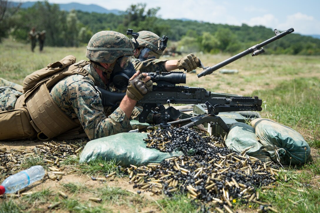 U.S. Marines with Black Sea Rotational Force 18.1, execute a barrel change during Exercise Platinum Lion 18 at Novo Selo Training Area, Bulgaria, Aug. 3, 2018. Platinum Lion is an annual field training exercise that reinforces relationships in a joint training environment, builds understanding of partner nation tactics, techniques and procedures, and increases interoperability with Allied and partner forces.