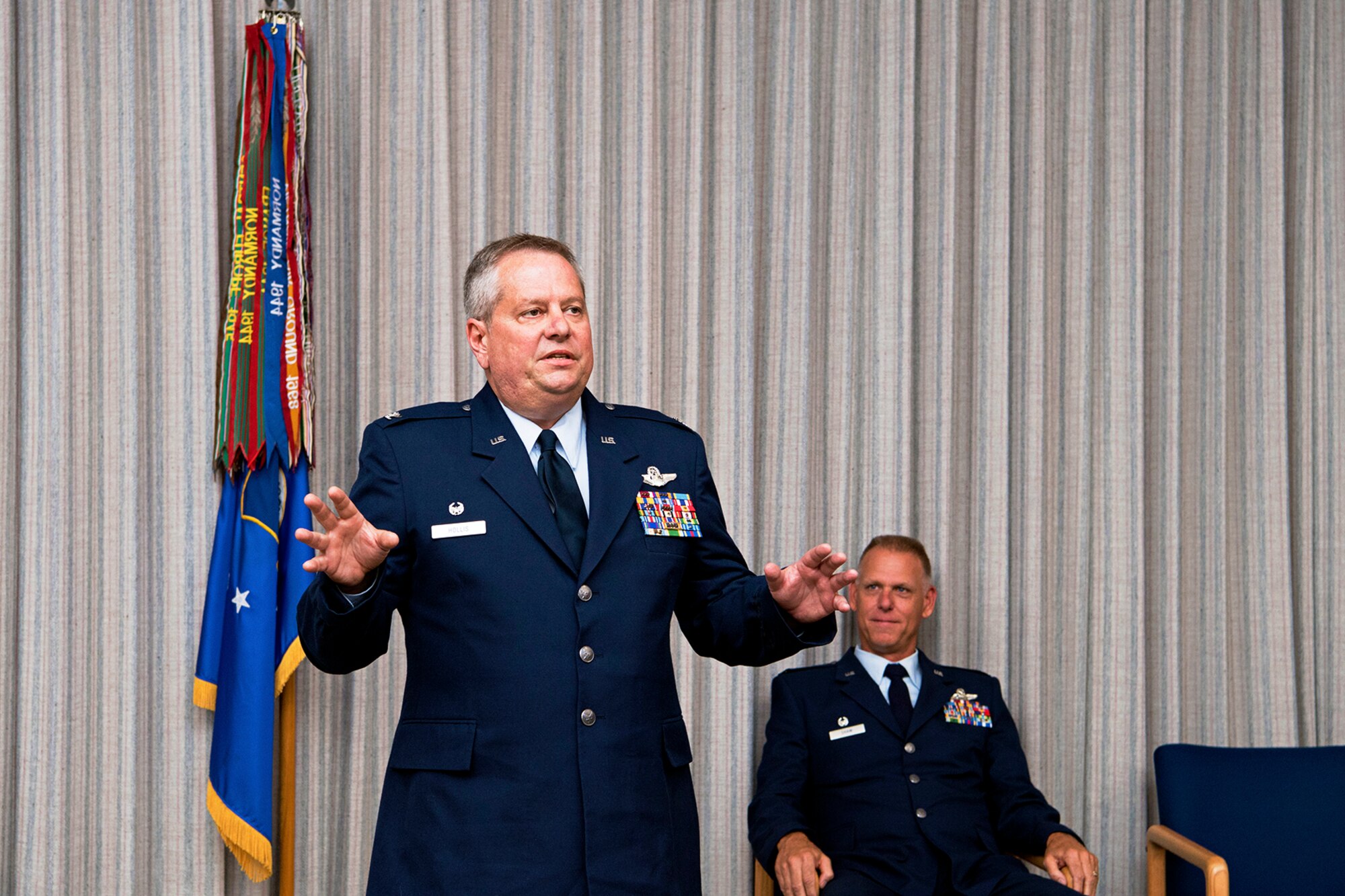 Colonel Brian Hollis, 434th Operations Group commander, addresses the audience at his assumption of command ceremony at Grissom Air Reserve Base, Ind., July 15, 2018. Hollis filled the vacancy of Lt. Col. Todd Moody, who retired in June. (U.S. Air Force photo / Senior Airman Harrison Withrow)