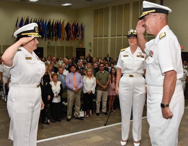 Rear Adm. Tina Davidson (left) assumes command of Navy Medicine Education, Training and Logistics Command, or NMETLC, during a combined change of command and retirement ceremony. Davidson will serve as NMETLC’s second commanding officer.