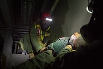 Extract Marines with Chemical Biological Incident Response Force assist and extract a survivor out of a simulated collapsed building during Exercise Chicago Response in Champaign, Illinois, July 25, 2018. This was the first time the active duty response force trained with Chicago-area first responders and served to establish a working relationship between CBIRF and the city of Champaign and Chicago.