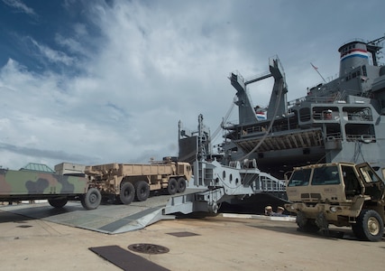 U.S. Army vehicles and assets are moved onto a vessel during Exercise Dragon Lifeline July 31, 2018, at the Federal Law Enforcement Training Center in Charleston, S.C.  The 841st Transportation Battalion hosted the exercise, facilitating training for Soldiers assigned to Fort Bragg, N.C., and Fort Eustis, Va. The exercise was designed to train participants in the planning and processes of rail, convoy, port and vessel operations.