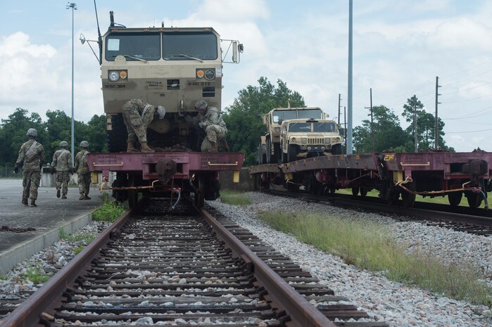 U.S. Army Soldiers conduct rail operations during Exercise Dragon Lifeline July 31, 2018, at Joint Base Charleston’s Naval Weapons Station, S.C. The 841st Transportation Battalion hosted the exercise, facilitating training for Soldiers assigned to Fort Bragg, N.C., and Fort Eustis, Va. The exercise was designed to train participants in the planning and processes of rail, convoy, port and vessel operations.