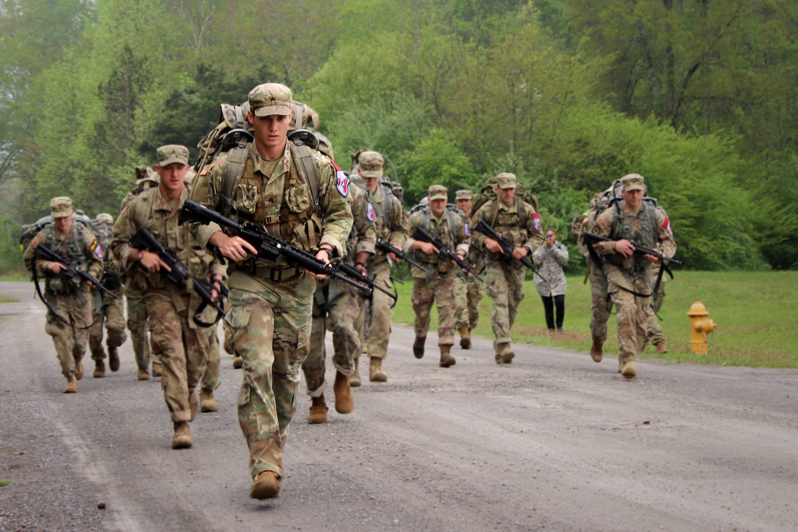 Sgt. Jordy Brewer with the 1st Battalion, 149th Infantry leads the pack in the ruck march event during the National Guard Region III Best Warrior Competition in Tullahoma, Tenn., April 26, 2018. Brewer, Kentucky’s NCO of the Year, would go on to win the Region III and national titles, sending him to the All-Army Best Warrior in September.
