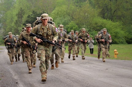 Sgt. Jordy Brewer with the 1st Battalion, 149th Infantry leads the pack in the ruck march event during the National Guard Region III Best Warrior Competition in Tullahoma, Tenn., April 26, 2018. Brewer, Kentucky’s NCO of the Year, would go on to win the Region III and national titles, sending him to the All-Army Best Warrior in September.