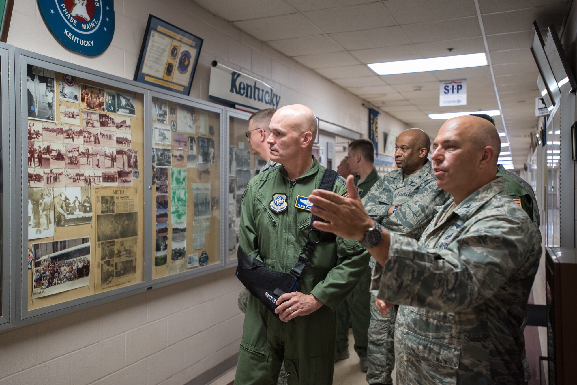 The commander of Air Mobility Command, Gen. Carlton D. Everhart II (left), views historical displays during a tour of the Kentucky Air National Guard Base in Louisville, Ky., Aug. 3, 2018. The wing is home to 1,200 Airmen and eight C-130H Hercules aircraft. (U.S. Air National Guard photo by Lt. Col. Dale Greer)