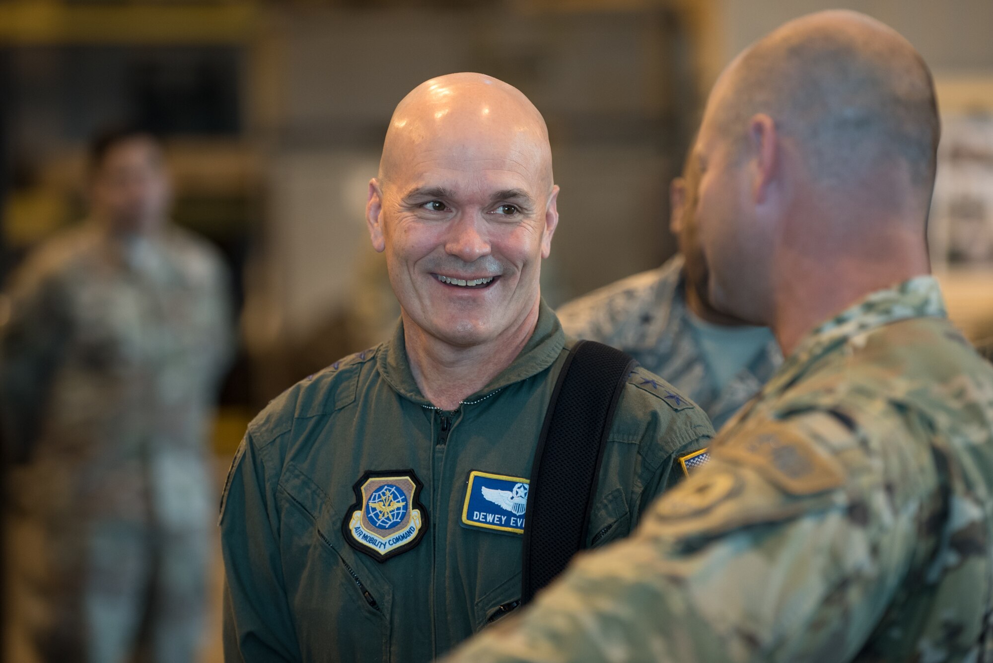 The commander of Air Mobility Command, Gen. Carlton D. Everhart II, speaks with Lt. Col. Steve Campbell, commander of the 123rd Global Mobility Squadron, during a tour of the Kentucky Air National Guard Base in Louisville, Ky., Aug. 3, 2018. The squadron and its parent unit, the 123rd Contingency Response Group, played key roles in hurricane recovery efforts last year. (U.S. Air National Guard photo by Lt. Col. Dale Greer)