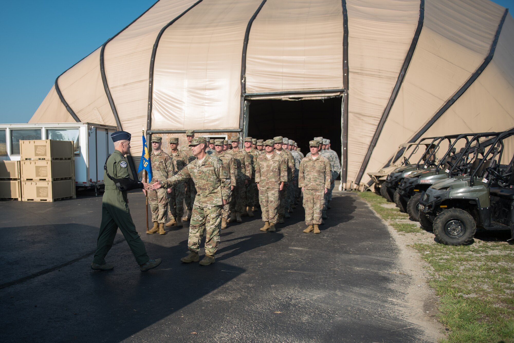 The commander of Air Mobility Command, Gen. Carlton D. Everhart II, greets Airmen from the 123rd Contingency Response Group during a tour of the Kentucky Air National Guard Base in Louisville, Ky., Aug. 3, 2018. The group was instrumental in hurricane recovery efforts last year. (U.S. Air National Guard photo by Airman Chloe Ochs)