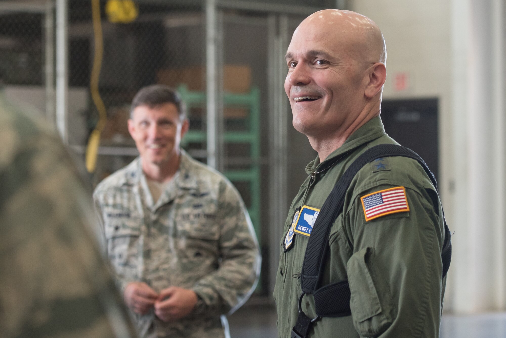 The commander of Air Mobility Command, Gen. Carlton D. Everhart II (right), speaks with Airmen from the 123rd Airlift Wing during a tour of the Kentucky Air National Guard Base in Louisville, Ky., Aug. 3, 2018. The wing is home to 1,200 Airmen and eight C-130H Hercules aircraft. (U.S. Air National Guard photo by Airman Chloe Ochs)
