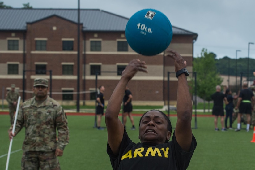 U.S. Army Command Sgt. Maj. Vickie Culp, Transportation Corps Regimental command sergeant major, participates in the standing power throw during an exhibition of the new Army Combat Fitness Test at Joint Base Langley-Eustis, Va., Aug. 1, 2018.