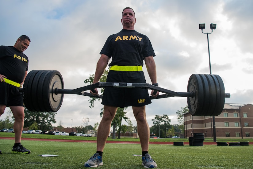 A U.S. Army Training and Doctrine Command senior leader participates in the strength deadlift during an exhibition of the new Army Combat Fitness Test at Joint Base Langley-Eustis, Va., Aug. 1, 2018.