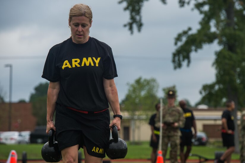 U.S. Army Brig. Gen. Heidi Hoyle, U.S. Army Ordnance School commandant and chief of ordnance, participates in the dumbbell carry portion of the sprint, drag and carry event of the new Army Combat Fitness Test at Joint Base Langley-Eustis, Va., Aug. 1, 2018.