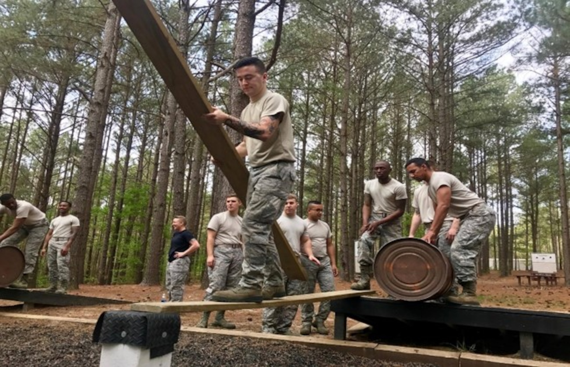 U.S. Airmen assigned to the 20th Logistics Readiness Squadron work together during “range control,” or an obstacle course, at Fort Jackson, S.C., 2018.